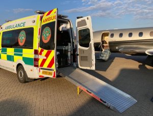 BM 101 at an airside transfer. Collection of a repatriatied patient from abroad for medical attention here in the UK. Land Ambulance. 
