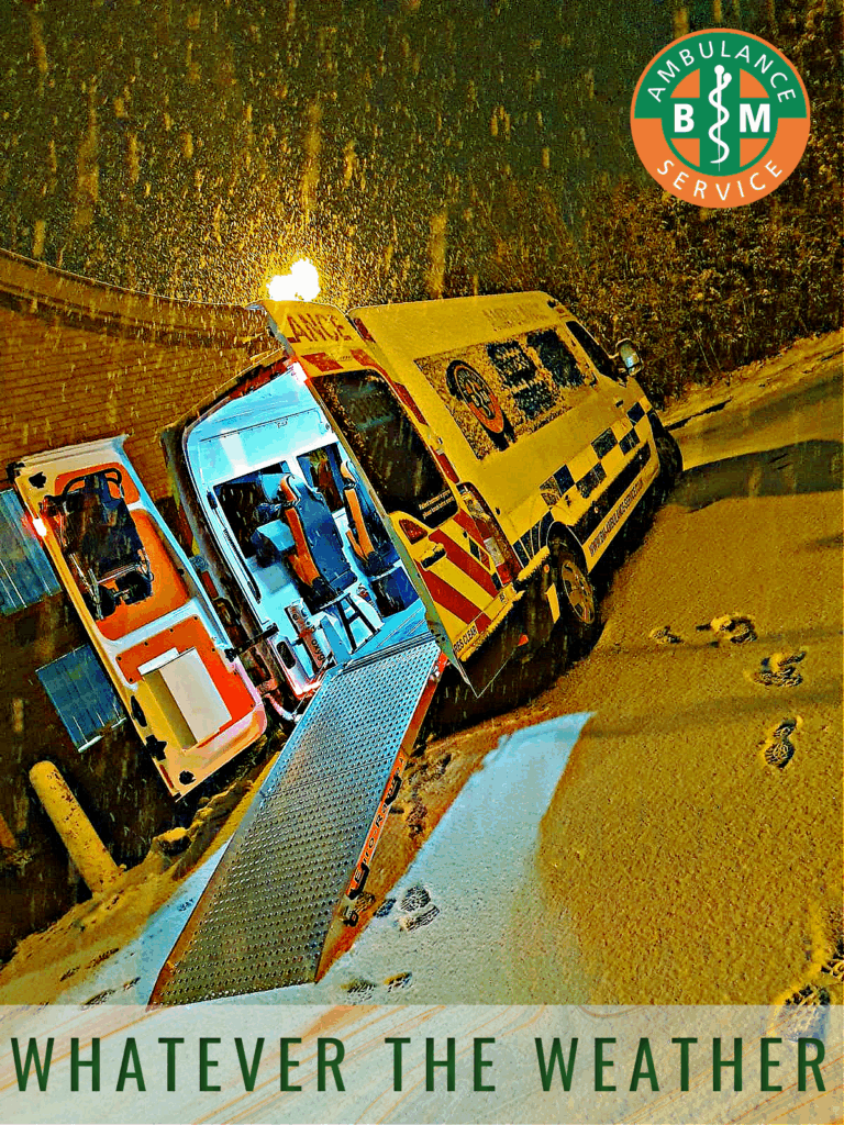 Private ambulance crew assisting a patient into a regulated medical vehicle