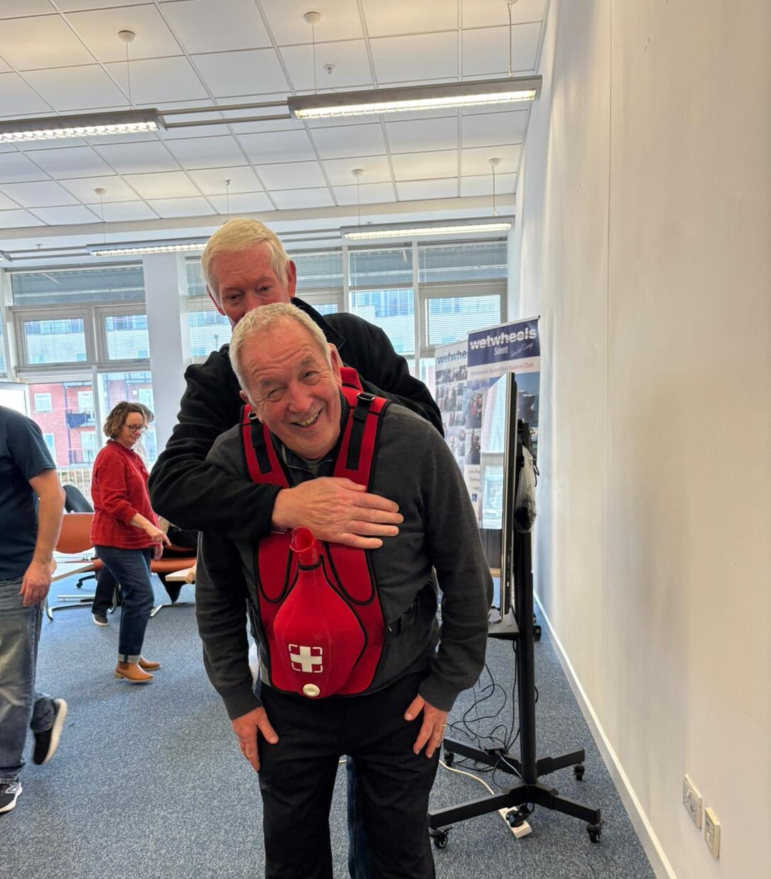Learners practising choking response techniques during an Emergency First Aid at Work course in Kent.