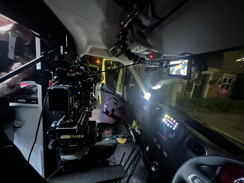 Professional camera rig mounted inside an ambulance for filming realistic emergency scenes during a film production.