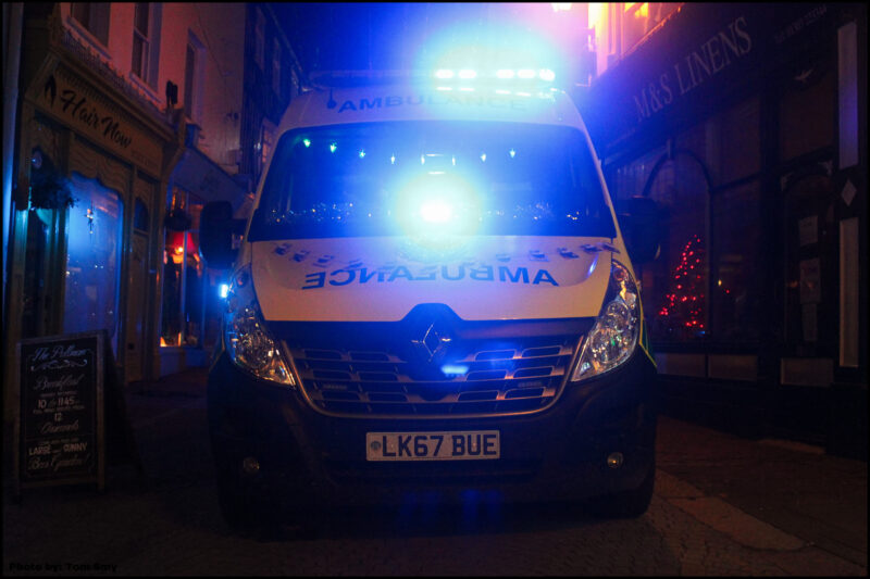 BM Ambulance Service ambulance responding to a high dependency patient transfer with emergency lighting